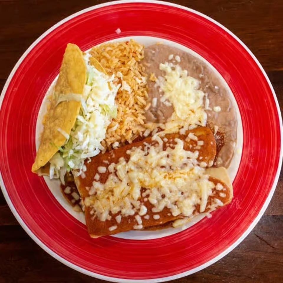 Two Enchiladas, Taco, Rice, and Beans.